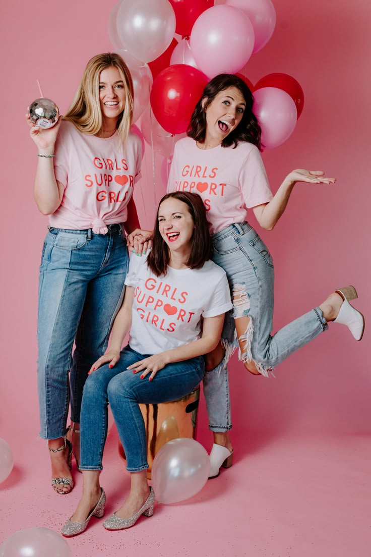 Fun friends portrait — three best friends celebrating with balloons